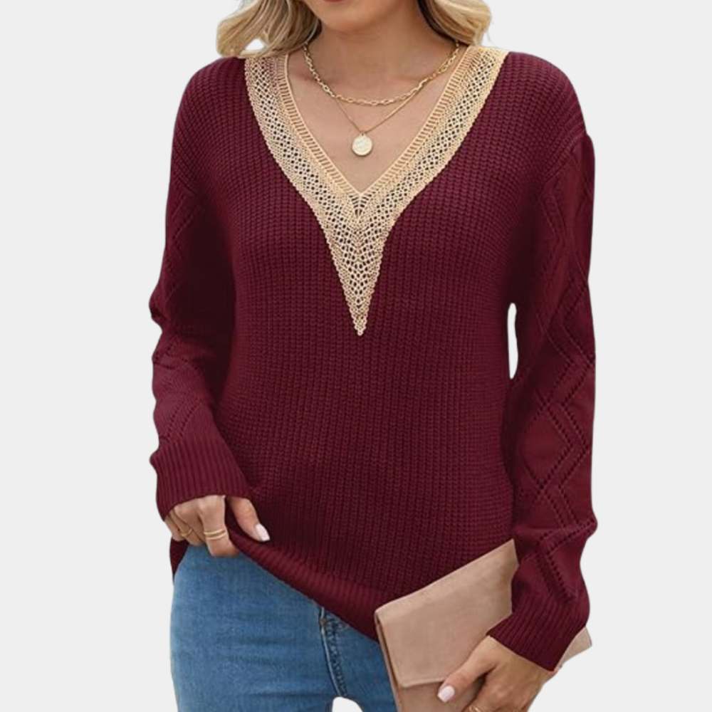 Knitted women's top with long sleeves