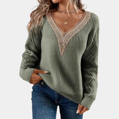 Knitted women's top with long sleeves