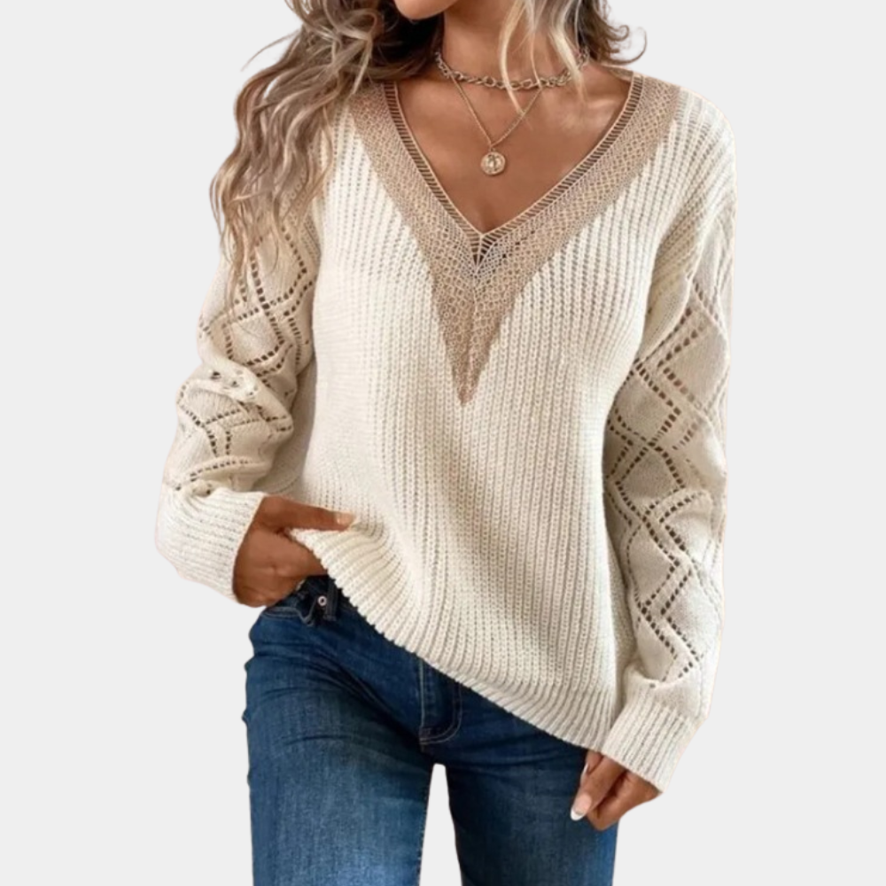 Knitted women's top with long sleeves
