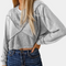 Joanie - Dames top met artistiek patchwork ontwerp