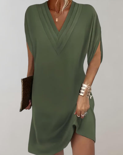 Stephanie - Elegante geplooide vleermuismouw minijurk