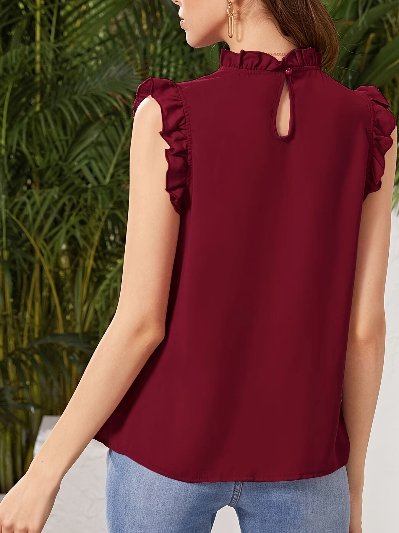 Jaja | Elegant Sleeveless Blouse with Ruffles and a Stand-Up Collar 