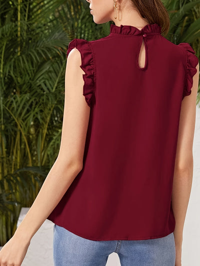 Jaja | Elegant Sleeveless Blouse with Ruffles and a Stand-Up Collar 