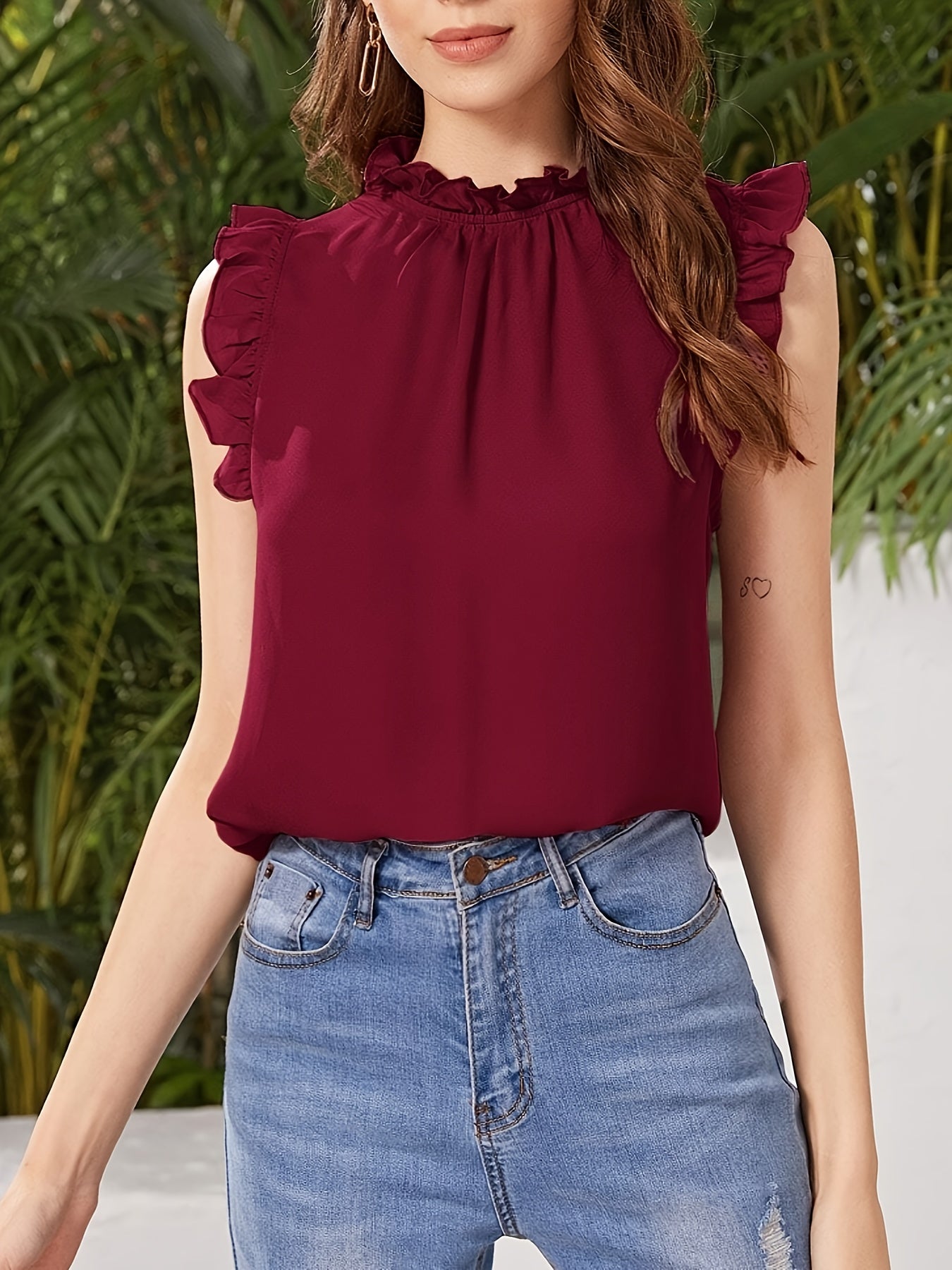 Jaja | Elegant Sleeveless Blouse with Ruffles and a Stand-Up Collar 