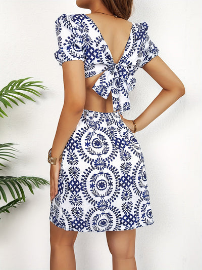 Kira | Zomerse Mini Jurk met Bloemenprint en Cut-Out Design