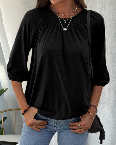 Dames top – Losvallende top met ronde hals en plooidetail