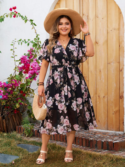 Alexa - V-hals bloemenprint plus maat midi-jurk