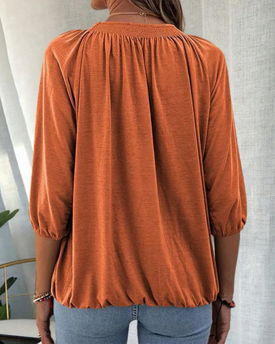 Dames top – Losvallende top met ronde hals en plooidetail