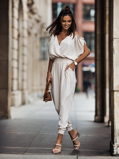 Lena | White jumpsuit with open shoulders