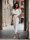 Lena | White jumpsuit with open shoulders