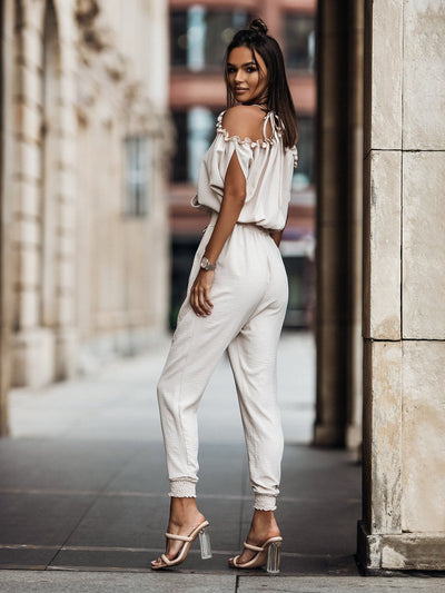 Lena | White jumpsuit with open shoulders