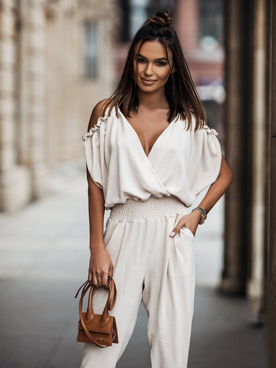 Lena | White jumpsuit with open shoulders