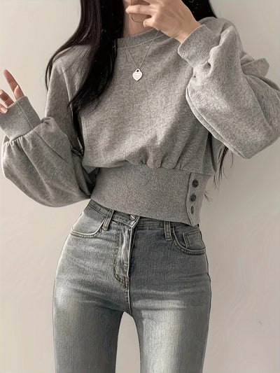 Selena | Trendy Sweater met Knoopdetails en Ballonmouwen