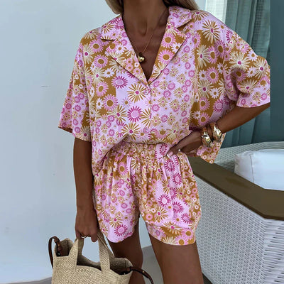 Yasmine - bloemen playsuit met riem