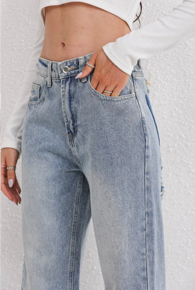 Straight fit jeans met distressed look – Vintage denim met eigentijdse details