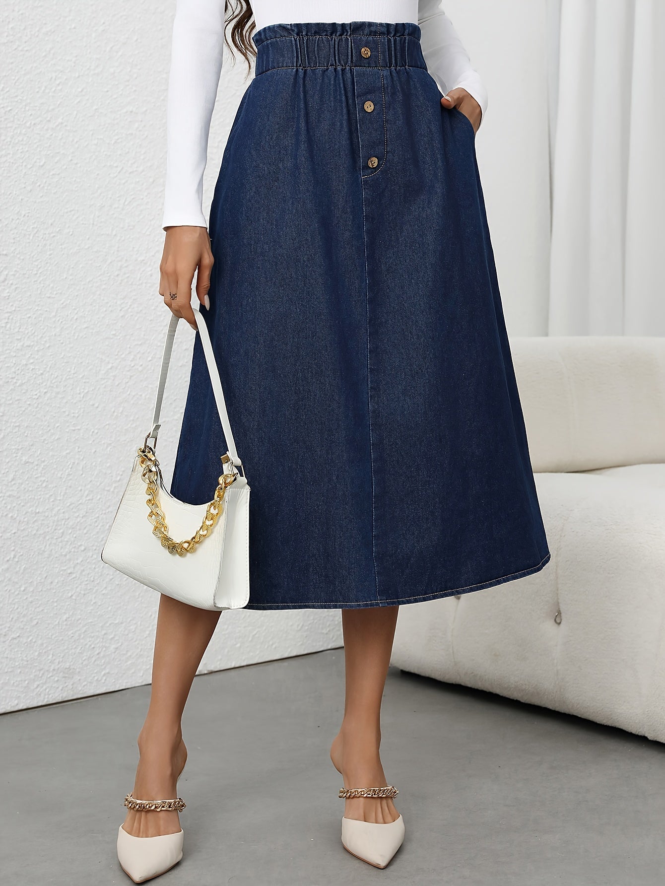 Fleur | High-waisted denim A-line midi skirt with button closure