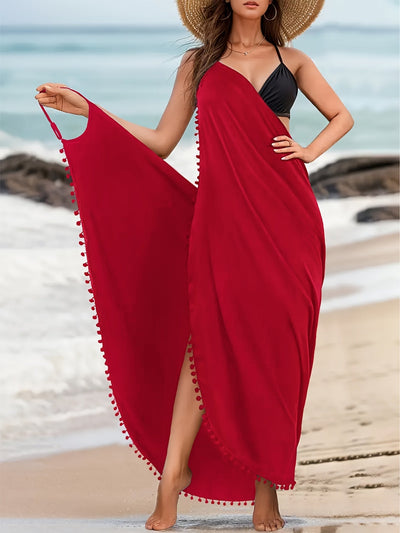 Emma | Effen maxi strandjurk met pom-pom-decor en V-hals