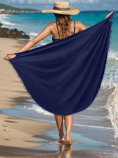 Emma | Effen maxi strandjurk met pom-pom-decor en V-hals
