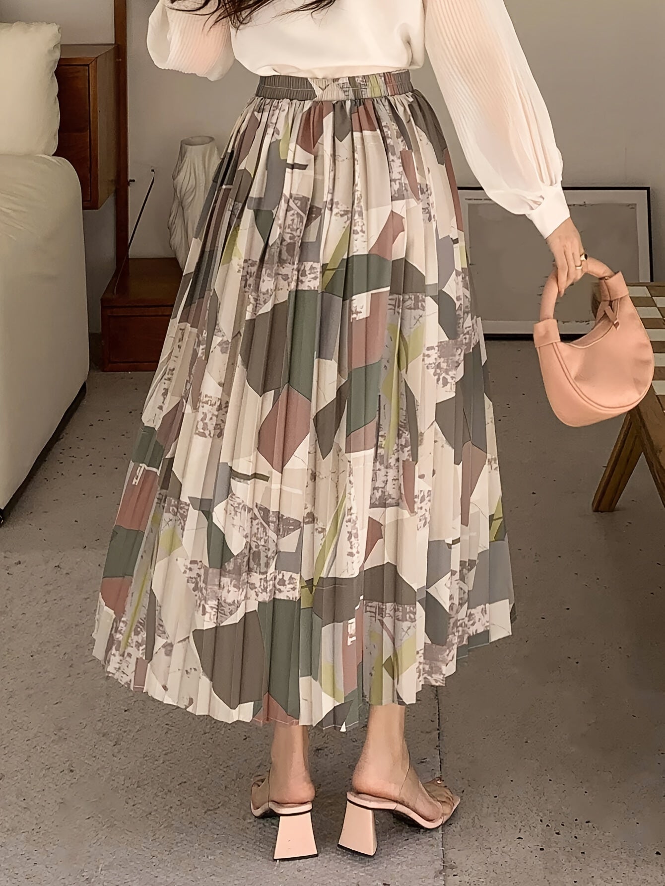 Lotte | Elegant allover print pleated A-line skirt