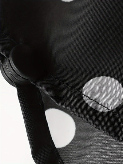 Femke | Lichtgewicht regenponcho-jack met stippenpatroon