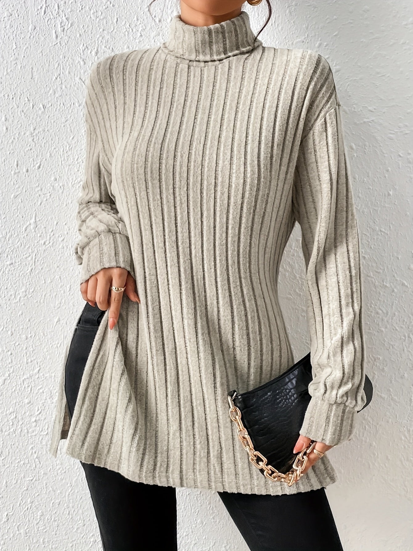 Nina | Geribbelde coltrui met split
