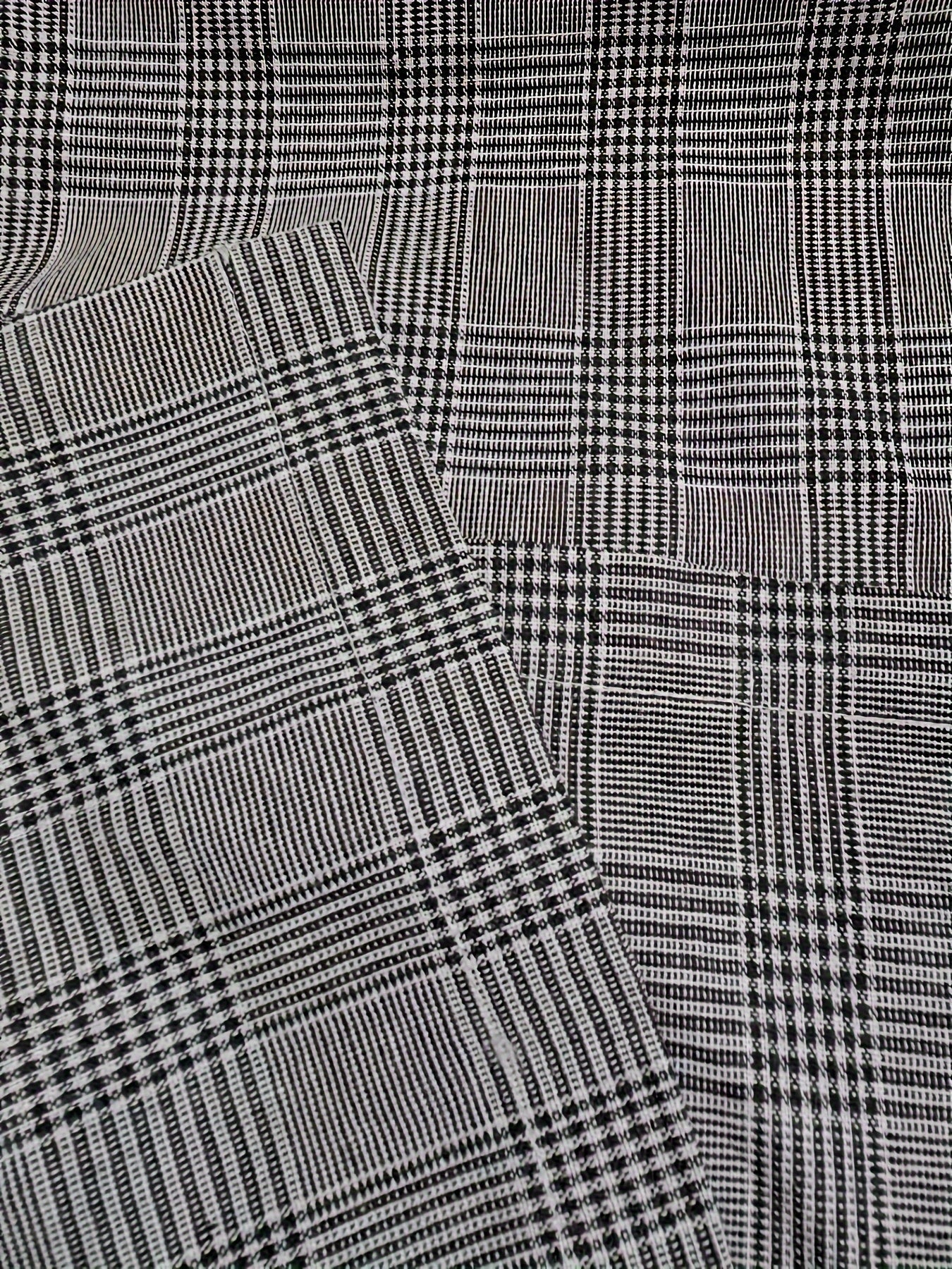 Jasmine | Checked print trousers with a tie belt