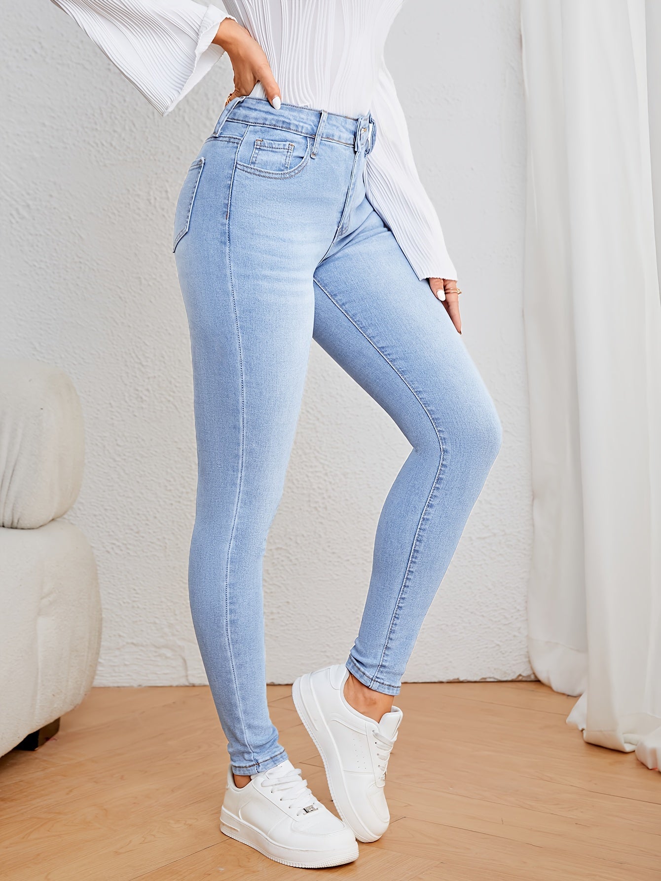 Roos | Lichtblauwe hoge taille skinny jeans