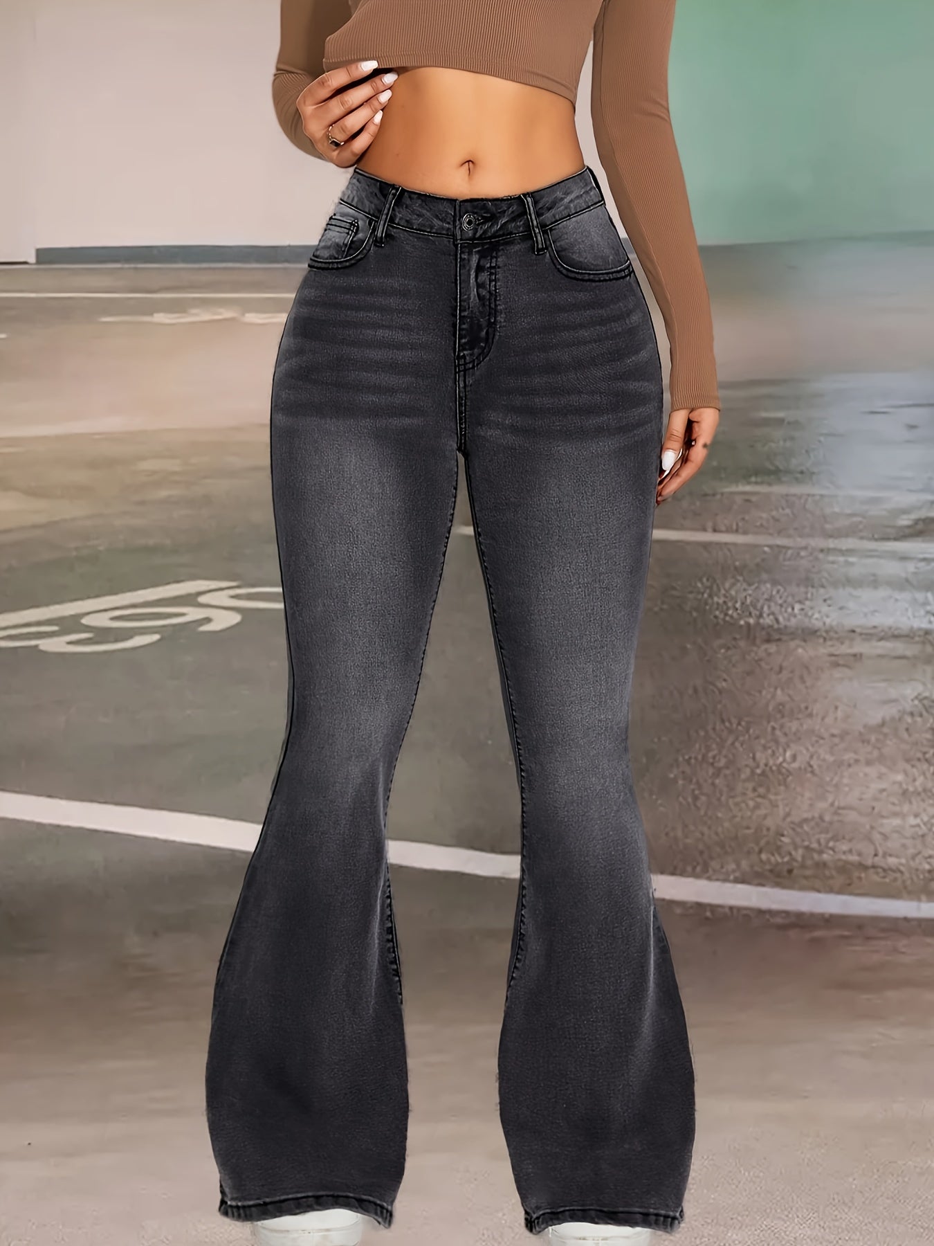 Elise | Stylish black and gray stretch flared jeans with a button detail