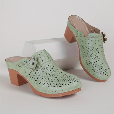 Flora | Women's mules with a thick heel and perforated floral decoration