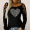Cut-out top met hartdetail – Glam rock met fonkelende touch