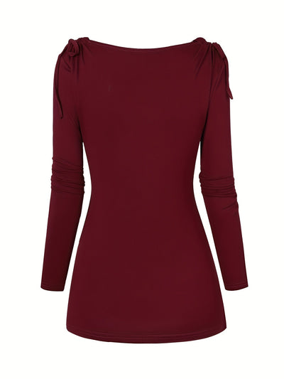 Isa | Elegant top with a waterfall neckline and decorative ruffles