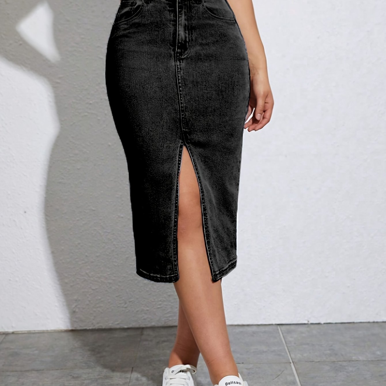 Mia | Gespleten denim rok met hoge taille en schuine zakken