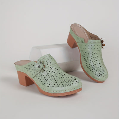 Flora | Women's mules with a thick heel and perforated floral decoration