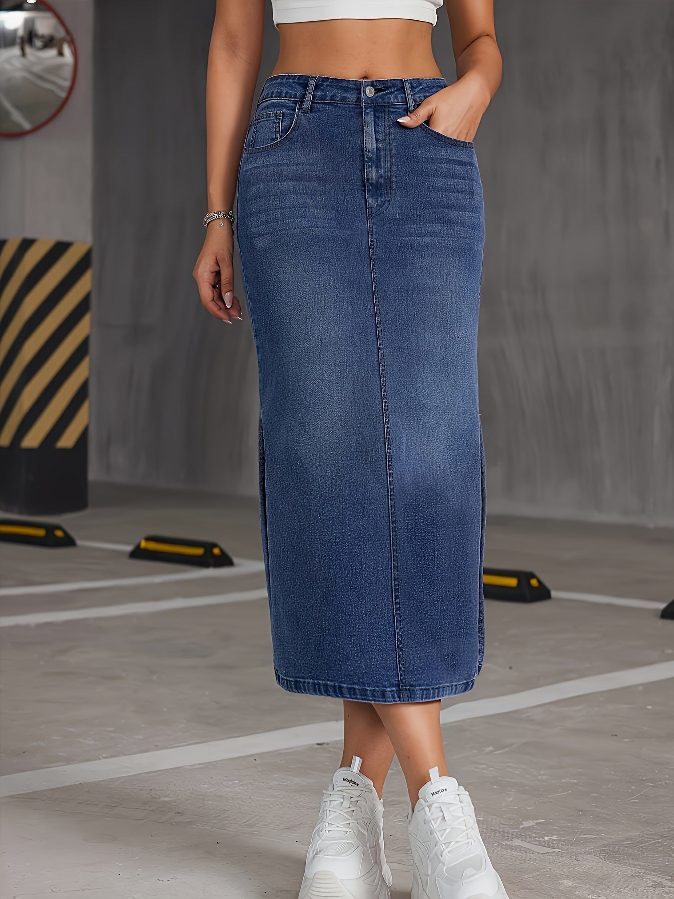 Nina | Blauwe denim midi-rok met hoge taille en schuine zakken