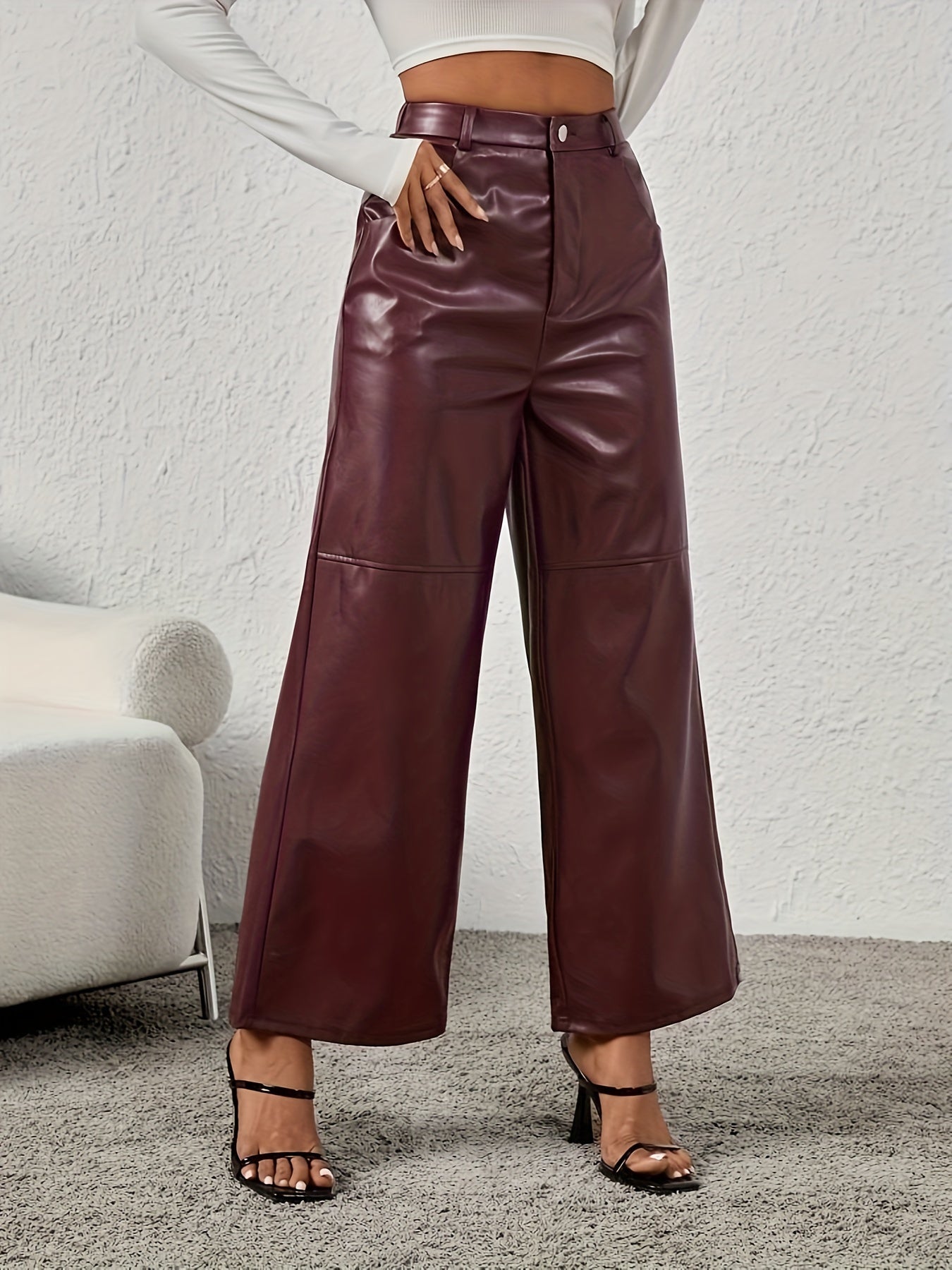 Lotte | Stylish wide imitation leather trousers with slanted pockets