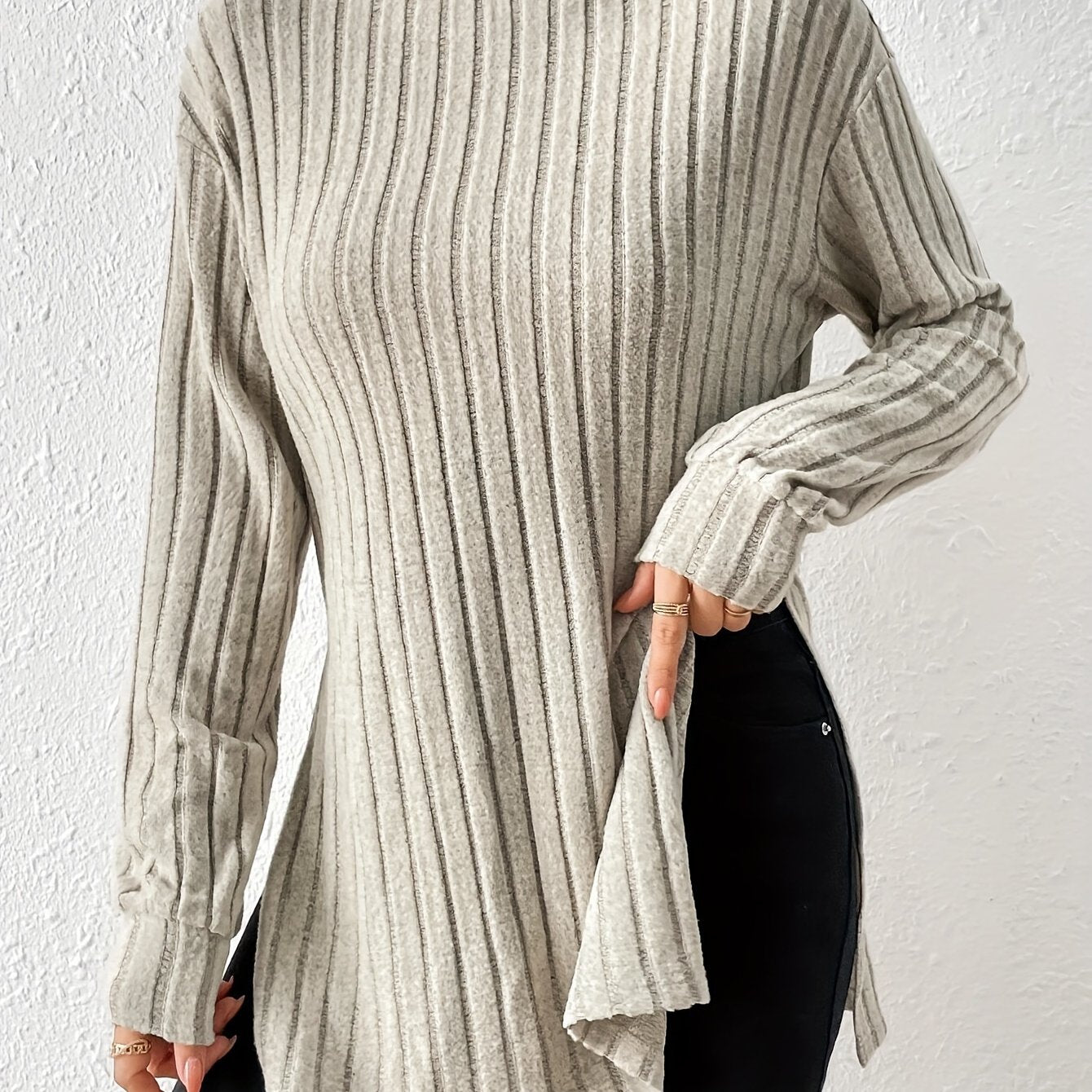 Nina | Geribbelde coltrui met split