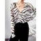 Juliette | Striped zebra blouse sweater