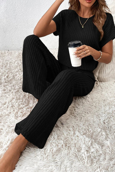 Noor – Zwarte Geribbelde Jumpsuit met Wijde Pijpen voor Dames