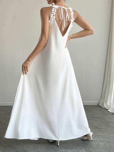 Danna | Elegante Maxi Jurk met Open Rug en Bloemenaccenten